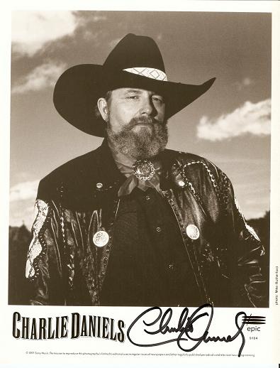 Item #031272 SIGNED, PROFESSIONAL PHOTOGRAPH OF CHARLIE DANIELS:; Country and southern-rock singer and songwriter. Charlie Daniels.