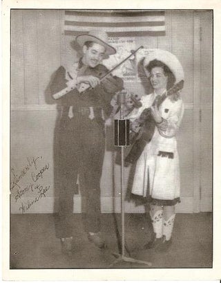 Item #032735 TWO (2) PROFESSIONAL PUBLICITY PHOTOGRAPHS:; One of Stoney & Wilma performing, and...