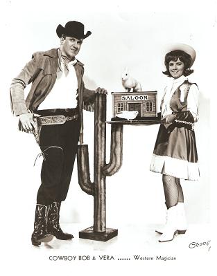 Item #034393 PROFESSIONAL PHOTOGRAPH OF MANNY DINNERSTEIN IN CHARACTER AS COWBOY BOB & VERA, WESTERN MAGICIAN:; American entertainer with a country & western bent. Manuel Dinnerstein.