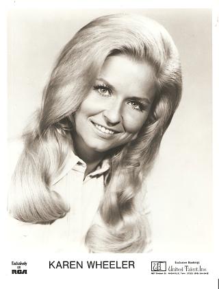 Item #034628 PROFESSIONAL PHOTOGRAPH OF KAREN WHEELER:; American country performer, recording on...