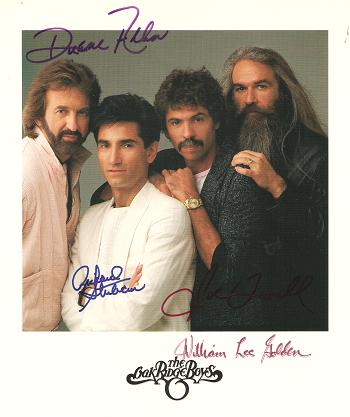 Item #035627 SIGNED, PROFESSIONAL PHOTOGRAPH OF THE OAK RIDGE BOYS:; Signed by all four in various colors of bold ink. Oak Ridge Boys.