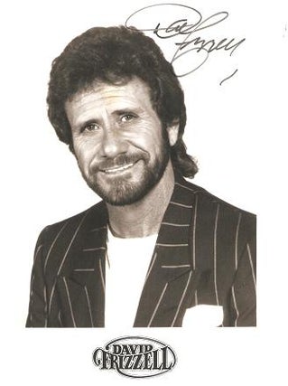 Item #035774 SIGNED, PROFESSIONAL PHOTOGRAPH OF COUNTRY-MUSIC STAR DAVID FRIZZELL. David Frizzell