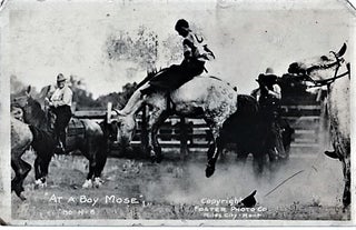 Item #041404 REAL-PHOTO POSTCARD OF A RODEO BAREBACK RIDER ON A BUCKING BRONCO, POSTMARKED 1920....